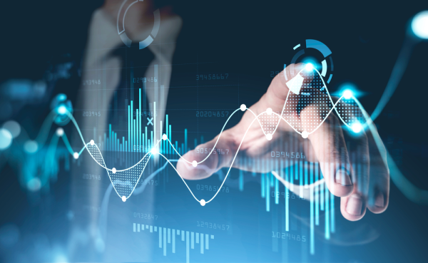 Abstrakcyjna grafika, na której mężczyzna dotyka palcem wykresu zmiany cen indeksów giełdowych
